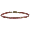 COLOURFUL HANDWOVEN BRACELET IN PINK TONES AND SILVER DETAILS