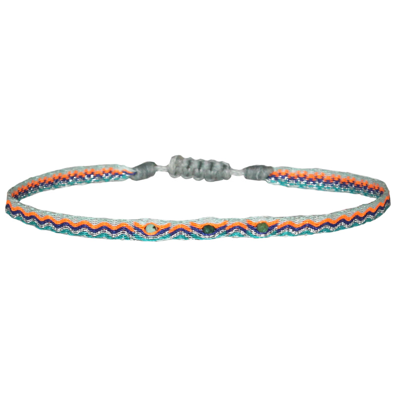 HANDWOVEN BRACELET WITH THREE TURQUOISE STONES