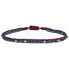 COLOURFUL HANDWOVEN BRACELET IN RED TONES AND SILVER DETAILS