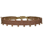   This beautiful hadmade bracelet has been handwoven in Colombia by our team of artisans using Polyester threads in burgundy tones with 14k rose gold filled beads.  This can be worn solo or with your favourite pieces.  Details:      Polyester threads     14k rose gold filled beads     Handwoven adjustable bracelet     Width 5mm     Can be worn in the water     Women bracelet