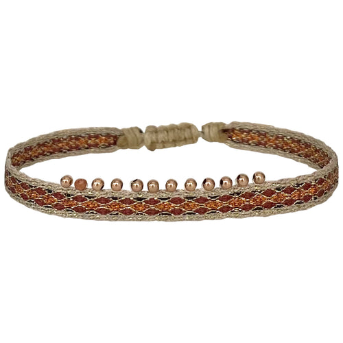 The new Chic bracelet design is here. Entirely Unique, It's set with a beautiful array of 14K rose gold beads and handwoven using polyester threads.  Wear it solo or stacked it together with your favourite LeJu bracelets.  Details:  -Rose gold filled beads  -Gold sandstone semi-precious stone  -Handwoven using polyester threads  -Adjustable bracelet   -Width:0.7 cm 