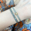 COLOURZIP HANDMADE BRACELET WITH INTERMIXED STONES IN BLUE AND NEUTRAL TONES