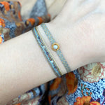 COLOURZIP HANDMADE BRACELET WITH INTERMIXED STONES IN BLUE AND NEUTRAL TONES