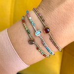 HANDMADE PEACOCK PINK TOURMALINE STONE BRACELET ON MODEL
