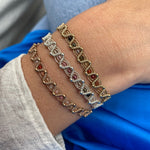 technique, 14K gold filled beads and intermixed semi precious stones.  Perfect for your summer holidays or to wear  with your favourite jeans   Details:  - Handwoven using metallic threads  - Intermixed semi-precious stones.  - 14K gold filled beads    - Adjustable Bracelet  - Width: 6mm  -Can be worn in the  water