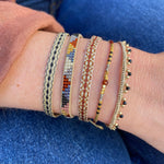 SET OF TWO HANDMADE BRACELETS WITH GOLD AND SPINEL SEMI-PRECIOUS STONES