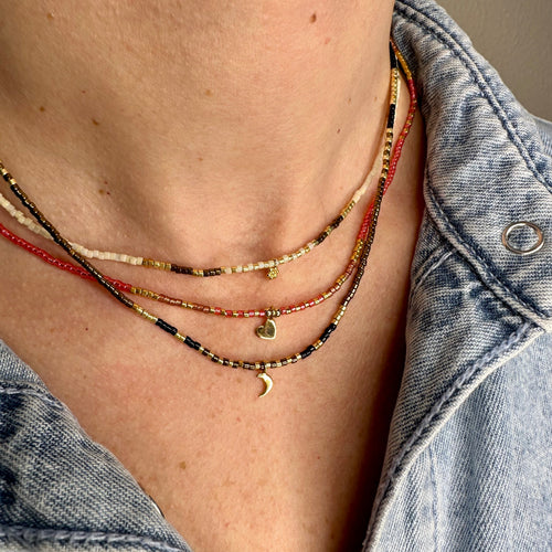 HEART NECKLACE WITH GOLD DETAILS IN PINK TONES