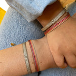 How nice is to match in style with the one who’s dearest to you. This handmade bracelet set belongs to the Mama & Me collection and is designed especially for mothers and daughters.  This bracelet is handwoven using polyester threads and features a grey diamond centrepiece .  Details:      Grey Diamond     Polyester threads     Adjustable bracelet     Width 6mm