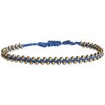 This delicate and beautiful bracelet is handwoven by our team of artisans using 14K gold filled beads and black threads.   You can wear it with your favourite bracelets all season long.   Details:  -14k gold beads details   -Adjustable bracelet  -Width: 3mm  -Can be worn in the water