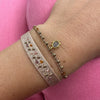   - Handwoven using Polyester  -Semi-precious stones  -14  gold filled beads  - Can be worn in the water - Width 8 mm -Adjustable bracelet -Women bracelet