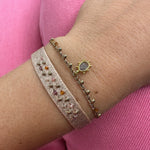   - Handwoven using Polyester  -Semi-precious stones  -14  gold filled beads  - Can be worn in the water - Width 8 mm -Adjustable bracelet -Women bracelet