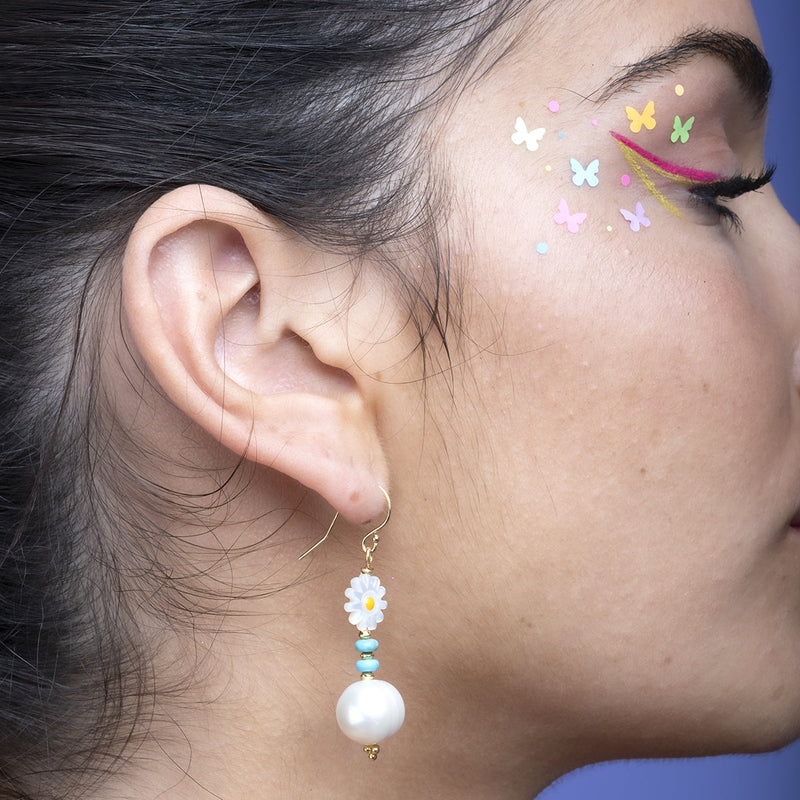 This delicate earrings are handmade by our team of master artisans and decorated with vermeil beads, turquoiose semi-precious stones, mother of pearl flowers and freshwater pearls. Pull your hair back to allow them to really shine.     Details:  - Handmade earrings  - 14K gold filled hooks  -Lenght: 40 mm  -Turquoise, mother of pearl and freshwater pearls  -Vermeil Beads